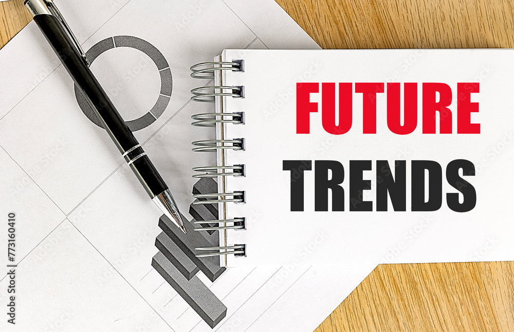 Poster future trends text on notebook with chart on wooden background