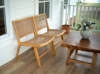 wooden table and chairs in the cafe. wooden chair and table at front porch