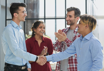 Hand shake in hallway for welcome collaboration or business meeting with respect.