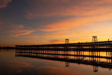 Fototapeta na wymiar Captivating sunset scenery unfolds at The Rio Tinto Pier (Muelle de Rio Tinto) in Huelva, Andalusia, Spain