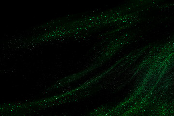 Fototapeta na wymiar abstract green speed camera motion background over glowing lights with sparkles, stars.