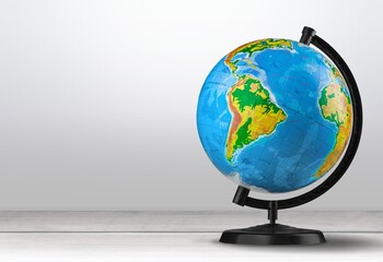 Classic school globe earth on desk