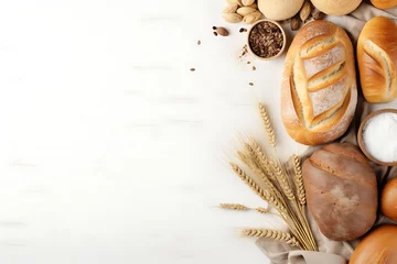  An array of freshly baked bread with wheat ears, flour, and grains on a white background, symbolizing baking and harvest. Generative AI © Breyenaiimages