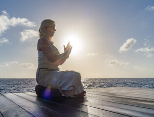 Female wellness instructor doing poses