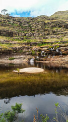 Small sand island formed in the middle of the natural pool of a waterfall. It is located in Serra do Cip&oacute; in Minas Gerais, Brazil