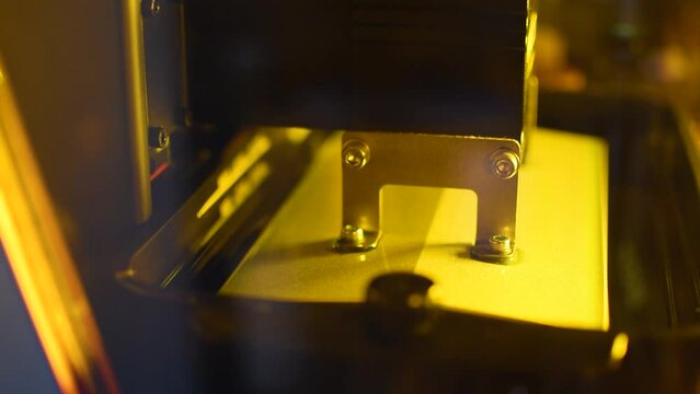 Detail of a 3d resin printer in operation