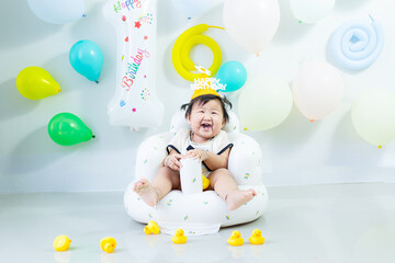 A girl is celebrating her 1st birthday,Indian baby girl celebrate her first birthday.