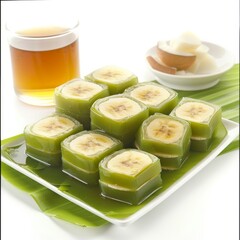 Pisang Ijo Makassar: A specialty dessert from Makassar, South Sulawesi, consisting of layers of thinly sliced banana wrapped in green rice flour jelly, served with syrup, coconut milk, and ice