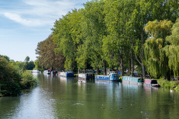 moored boats on the river thames