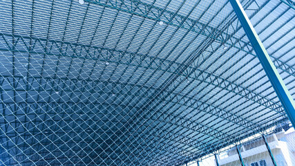 Sports nets and roofs. Plastic stadium netting and soccer balls for safety and neatness in sports stadiums with copy space with selective focus.