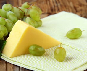 block cheese and fresh green grapes