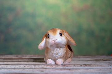 Rabbit on wooden table , Pascha or Resurrection Sunday concept