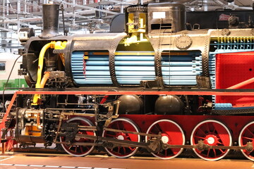 Vintage locomotive retro train. Beautiful locomotive in black and red colors.