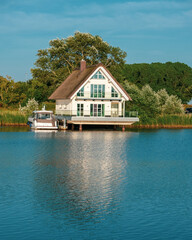 Fototapeta na wymiar Lake houses in modern neighborhood view
