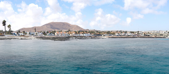 Panoramic View of Coastal Village from the Ocean on a Sunny Day.Fuerteventura,Canary Island.
