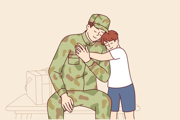 Return home of soldier who served in army and is rejoicing at long-awaited meeting with son. Loving boy meets hero father in camouflage clothes from army, or performing dangerous task in war.