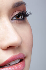 Close-up shot of human female face. Woman with natural lips and eyes beauty makeup - 773289077