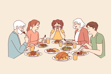 Large family has dinner together after completing religious fast, sitting around table with food. Happy seniors with children and granddaughter having thanksgiving dinner, eating turkey meat