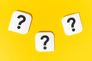 Group of Question marks signs on yellow background