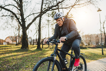 Man Riding Bike in a Park