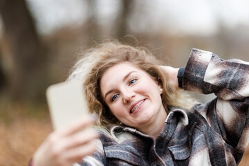 Woman Making a Selfie With Her Cell Phone