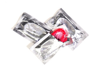 Condoms isolated on solid background - 773313079