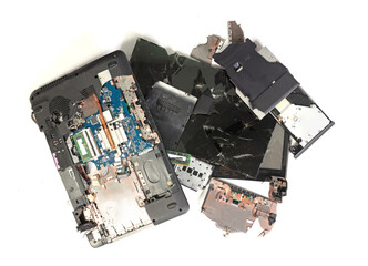 Old broken laptop isolated on white background