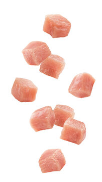 Falling Raw chicken, fillet, isolated on white background, full depth of field