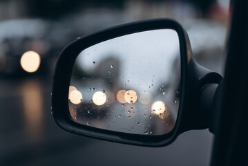 rear view mirror of black car