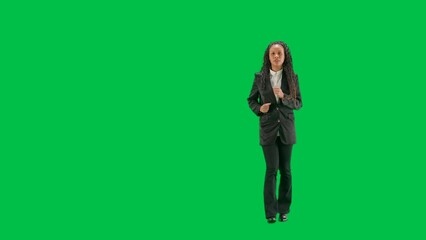 Young female reporter isolated on chroma key green screen background. Full shot african american woman tv news host running.