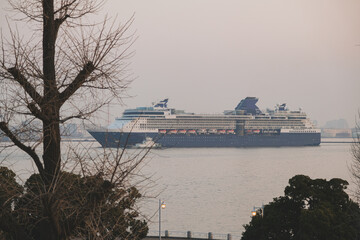 Modern family cruiseship cruise ship liner Millennium in Yokohama port near Tokyo, Japan during...