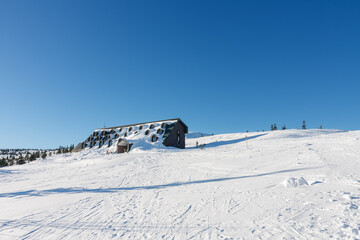 Cottage Vyrovka,  cottage covered by snow, height quota 1356  m,  krkonose mountains Czech Republic - obrazy, fototapety, plakaty