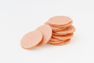 Vintage snack hawthorn slices on white background