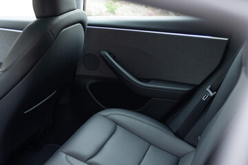 Rear leather passenger seats in modern lux car. Leather car passenger seat. Modern car interior...