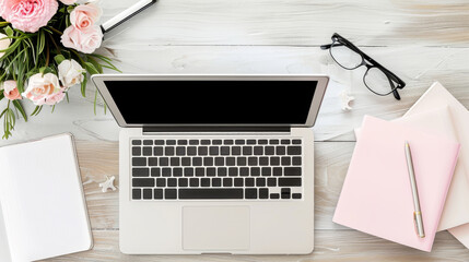 Laptop with notepad, pen, flowers and sedge on a white wooden table, top view. Laptop with clean keyboard.
