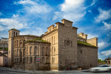 Fototapeta na wymiar Emblematic 13th century Catholic church with Moorish architecture and bell tower. Toledo, Castilla la Mancha, Spain