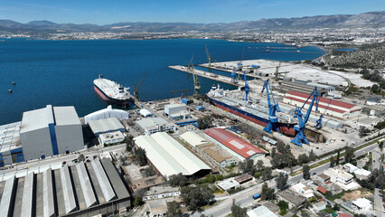 Aerial drone photo of port town and recently renovated ship yard of Skaramagas in Western area of Attica, Elefsina bay, Attica, Greece