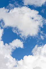 White clouds in the deep blue sky - 773367419