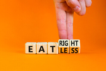 Eat less or right symbol. Concept words Eat less or Eat right on wooden cubes. Beautiful orange table orange background. Doctor hand. Healthy lifestyle and eat less or right concept. Copy space.