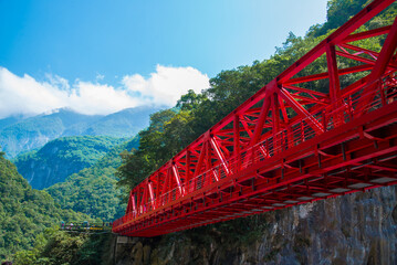 Taroko, Taiwan: May 27 2015: Red bridge across the Taroko Canyan
