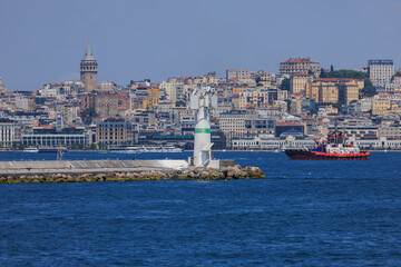 Embankment and sea, beach and buildings of a southern city, public place in Turkey, on a summer sunny day