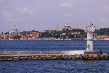 Embankment and sea, beach and buildings of a southern city, public place in Turkey, on a summer sunny day