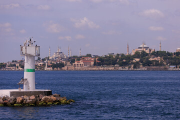 Embankment and sea, beach and buildings of a southern city, public place in Turkey, on a summer sunny day