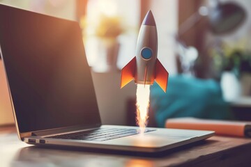Rocket coming out of laptop on office table, startup concept