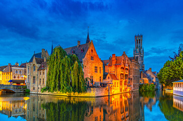 Bruges cityscape, Brugge old town scenic view, Bruges historical city centre, Rosary Quay Rozenhoedkaai embankment, Belfort tower, Dijver water canal, evening view, West Flanders province, Belgium