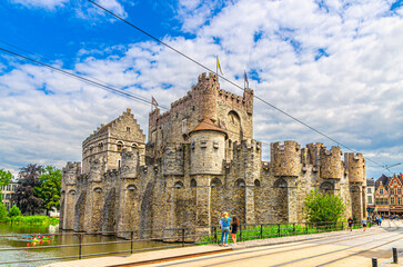The Castle of the Counts Gravensteen medieval castle with stone walls on bank of Lieve water canal in Ghent historical city centre, Gent old town, East Flanders province, Flemish Region, Belgium