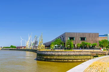 Foto op Canvas Hangar 26-27 office building former port warehouse on bank of Scheldt river in Antwerp city historical centre, Antwerpen port area, Antwerpen old town, Flemish Region, Belgium © Aliaksandr