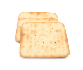 Tasty crispy square crackers isolated on white