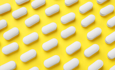 Vitamin pills on yellow background, flat lay