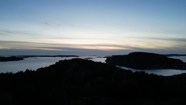 Drone shot of an early sunset on a cold and clear late autumn day at Ror on the Swedish west coast.